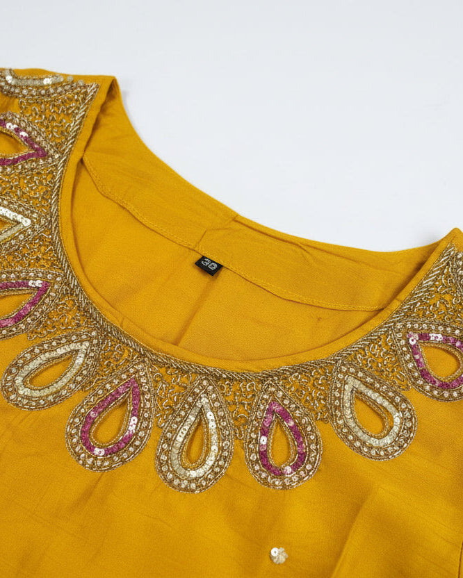 Yellow Raw silk fabric with cut work bead design.