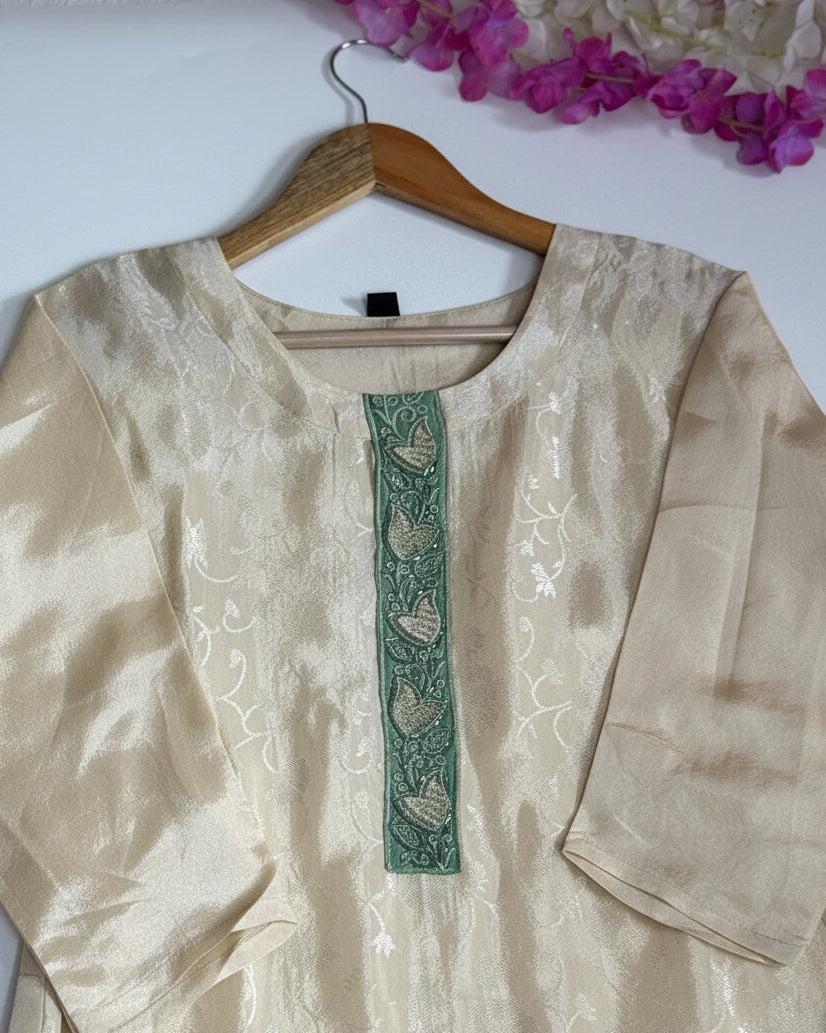Crepe Jacquard Beige kurta with green embroidery.